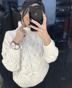 Women's Chunky Knit Sweater with High Neck and Detailed Cable Design