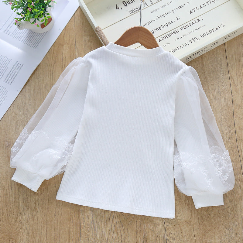 Women's Blouse with Sheer Tulle Sleeves and Fine Embroidery