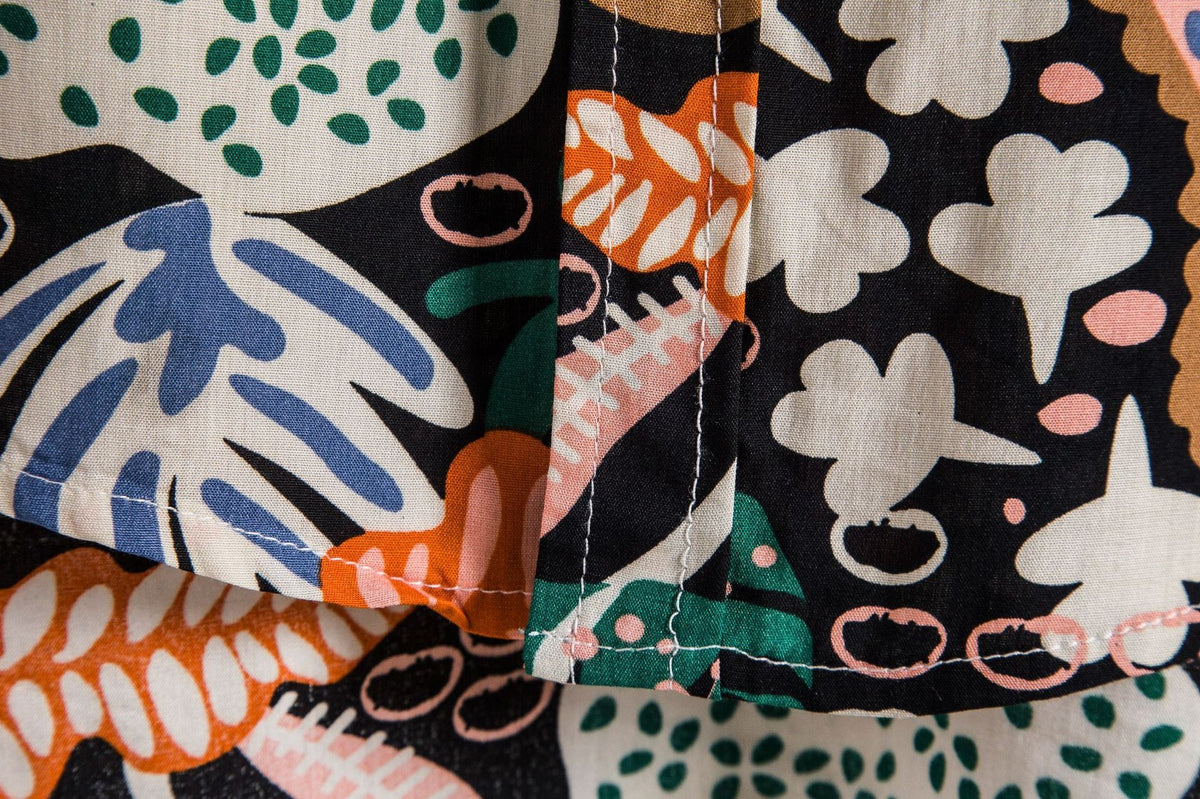 Women's Short-Sleeve Shirt with Vibrant Botanical Print and Comfortable Fit