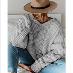 Women's Chunky Knit Sweater with Decorative Cable Details and Relaxed Fit