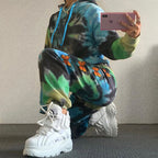 Women's Hooded Suit with Colorful Tie-Dye Pattern and Floral Appliqués