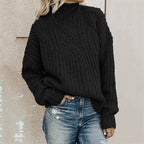 Women's Chunky Knit Sweater with High Collar and Cable Details