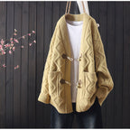 Women's Chunky Knit Jacket with Unique Cable Pattern and Practical Pockets