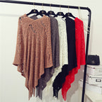 Women's Crochet Poncho with Fringed Edges and Fine Openwork Pattern