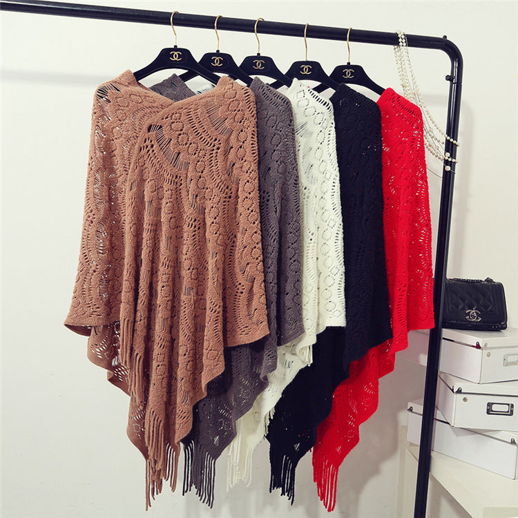 Women's Crochet Poncho with Fringed Edges and Fine Openwork Pattern