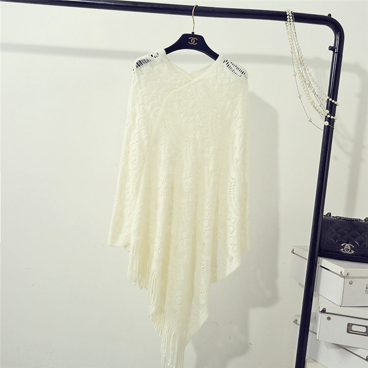 Women's Crochet Poncho with Fringed Edges and Fine Openwork Pattern