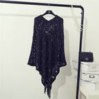Women's Crochet Poncho with Fringed Edges and Fine Openwork Pattern