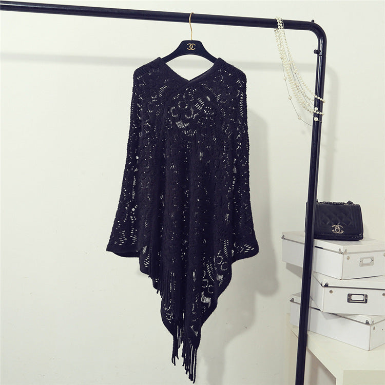 Women's Crochet Poncho with Fringed Edges and Fine Openwork Pattern