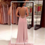 Elegant Evening Dress with Deep V-Neck and Shimmering Details