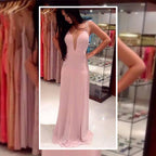Elegant Evening Dress with Deep V-Neck and Shimmering Details
