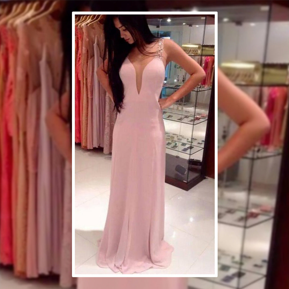 Elegant Evening Dress with Deep V-Neck and Shimmering Details