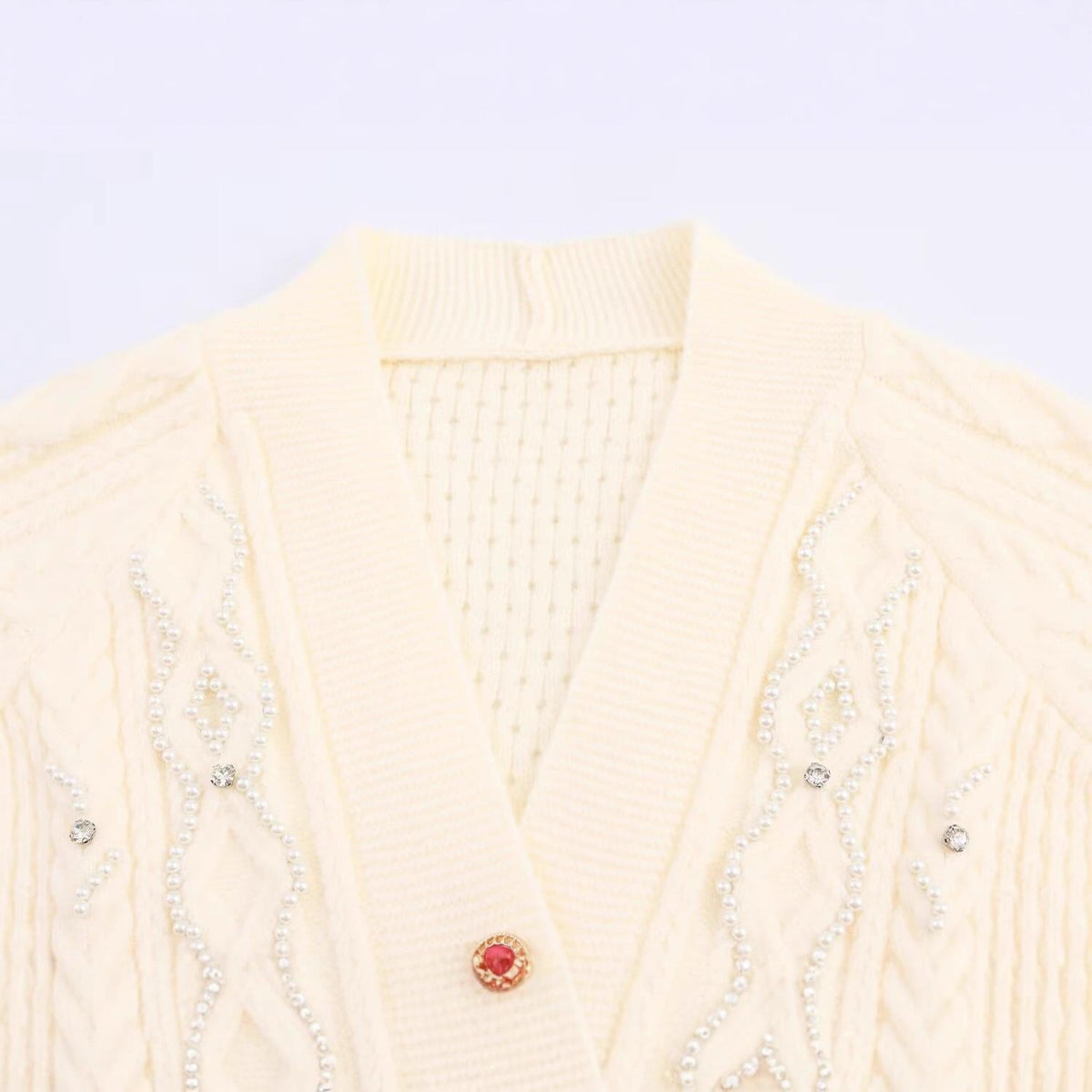 Women's Elegant Cardigan with Decorative Buttons and Ruffle Details