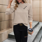 Women's Elegant Sweater with Asymmetrical Neckline and Button Details