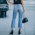 Women's High-Waisted Jeans with Frayed Details and Rips