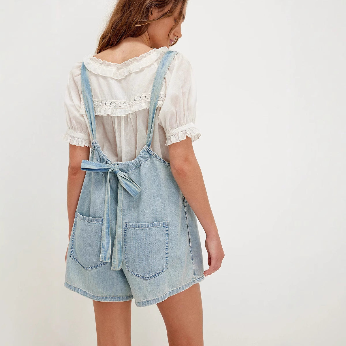 Women's Denim Jumpsuit with Ruffled Neckline and Adjustable Straps