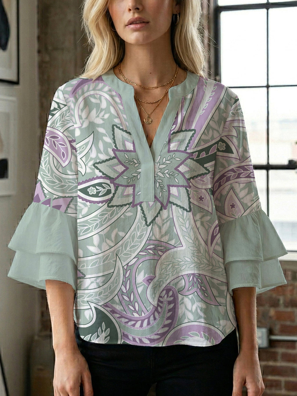Women's Blouse with Voluminous Ruffle Sleeves and Floral Design