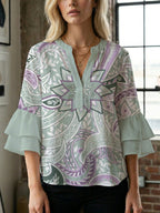 Women's Blouse with Voluminous Ruffle Sleeves and Floral Design