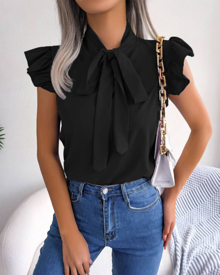 Women's Blouse with Ruffle Details and Chic Bow Element