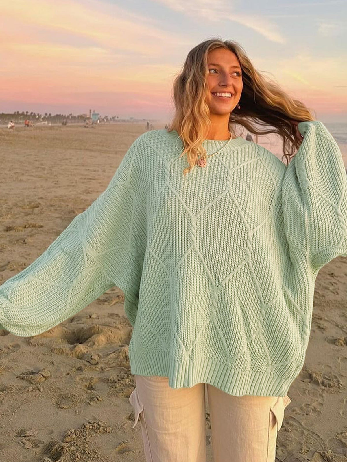 Women's Chunky Knit Sweater with Asymmetric Cut and Wide Hem