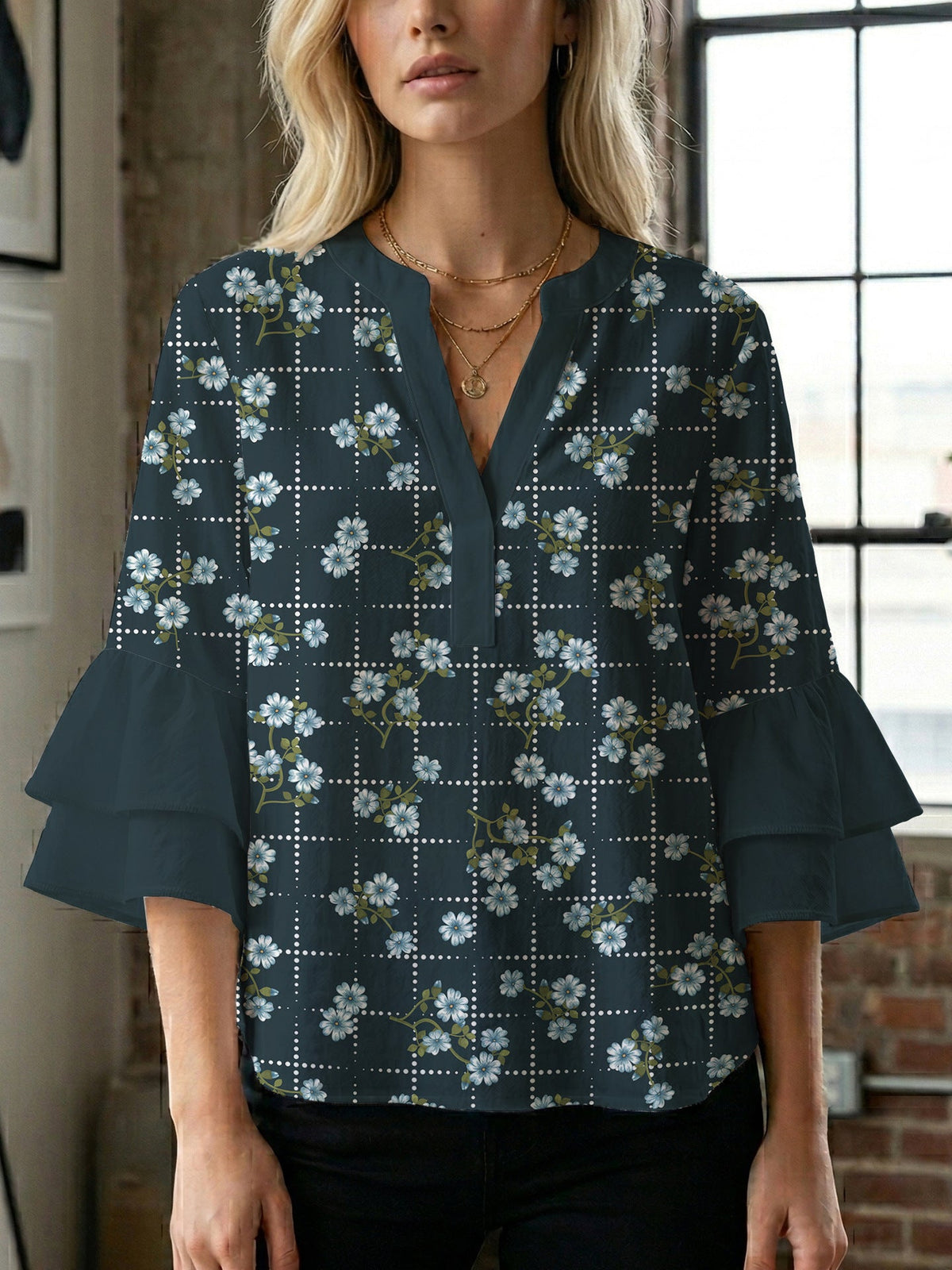 Women's Blouse with Voluminous Sleeves and Floral Design