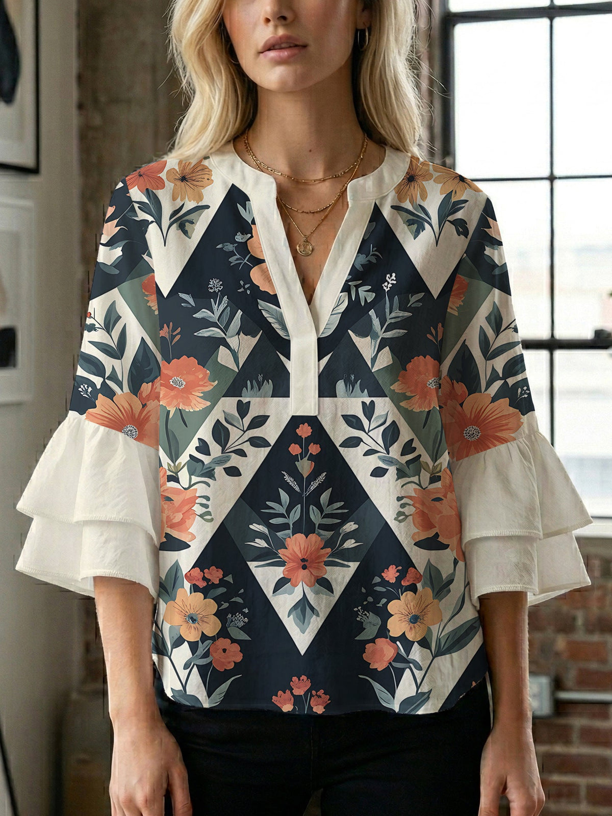 Women's Blouse with Voluminous Ruffle Sleeves and Modern Print