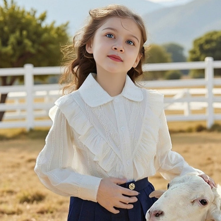 Women's Blouse with Ruffle Details and Fine Embroidery