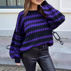 Women's Cozy Knit Sweater with Cable Knit Pattern and Graphic Accents