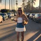Women's Mini Denim Skirt with Voluminous Ruffled Hem and Fitted Cut