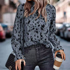 Elegant Women's Blouse with Ruffle Hem and Asymmetrical Pattern