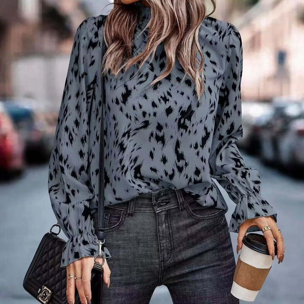 Elegant Women's Blouse with Ruffle Hem and Asymmetrical Pattern