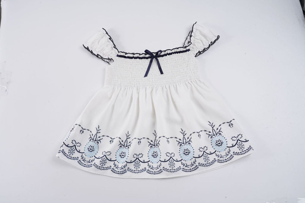 Women's Cotton Blouse with Floral Embroidery and Ruffled Hem