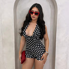 Elegant Playsuit with Deep V-Neck and Modern Polka Dot Pattern