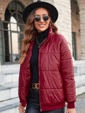 Women's Elegant Quilted Jacket with High Collar and Modern Pockets