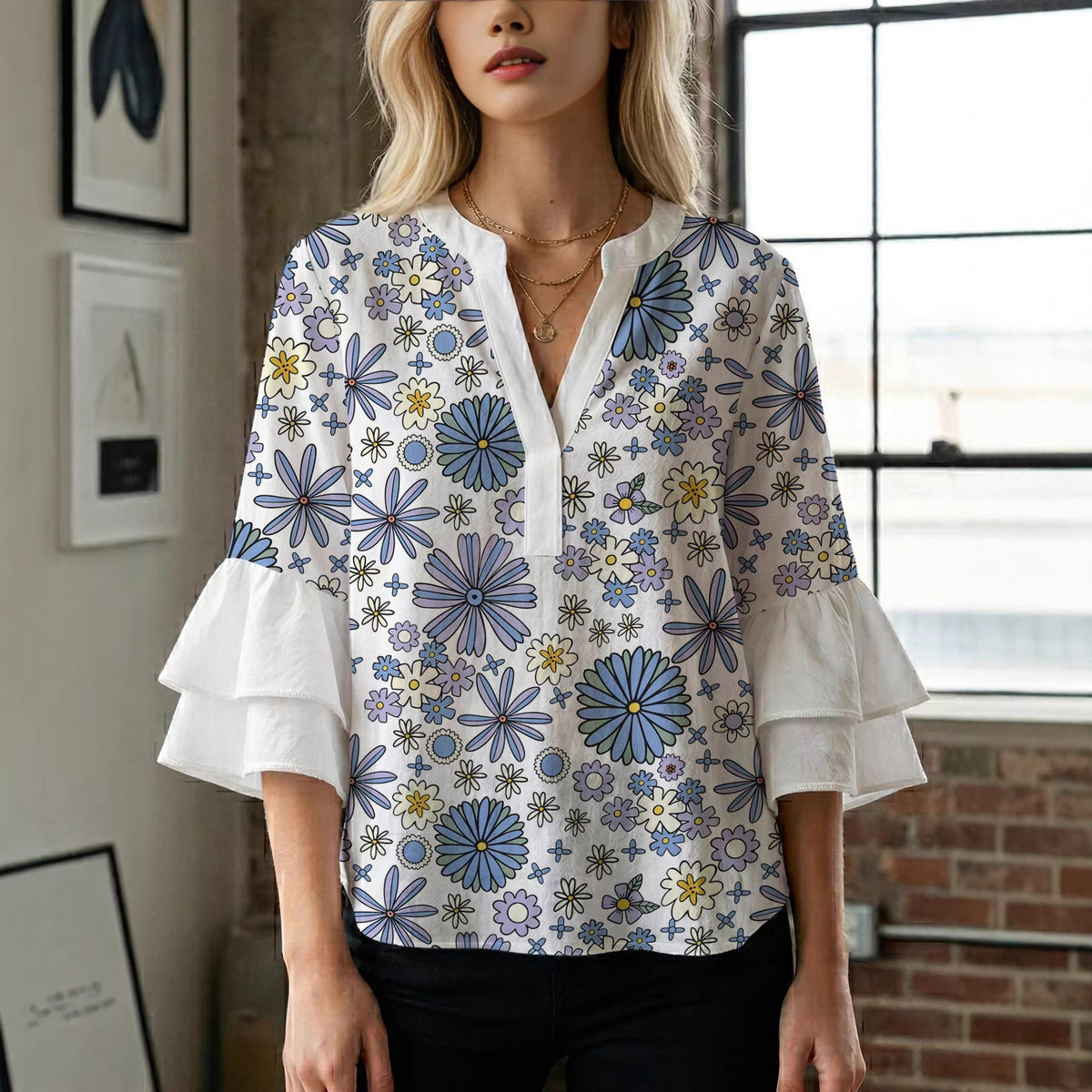 Women's Blouse with Voluminous Sleeves and Floral Design