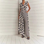 Elegant Jumpsuit with Wrap Belt and Geometric Pattern