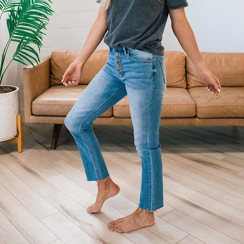 Women's High-Waist Jeans with Button Detail and Frayed Hem