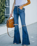 Women's Flared Jeans with Frayed Hem and High Waist