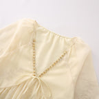 Women's Lightweight Blouse with Flowing Cut and Elegant Tie Details
