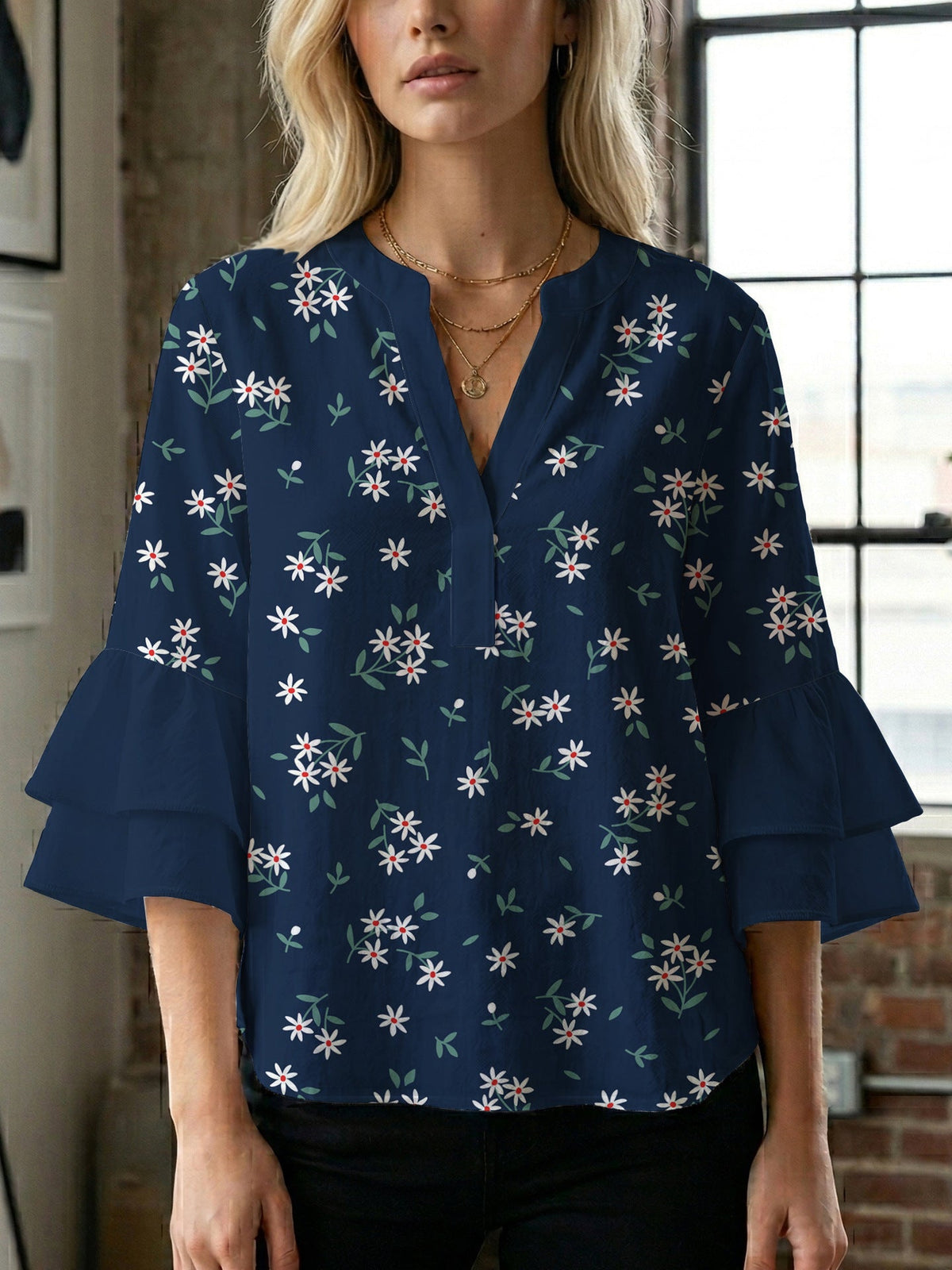 Women's Blouse with Voluminous Sleeves and Floral Design