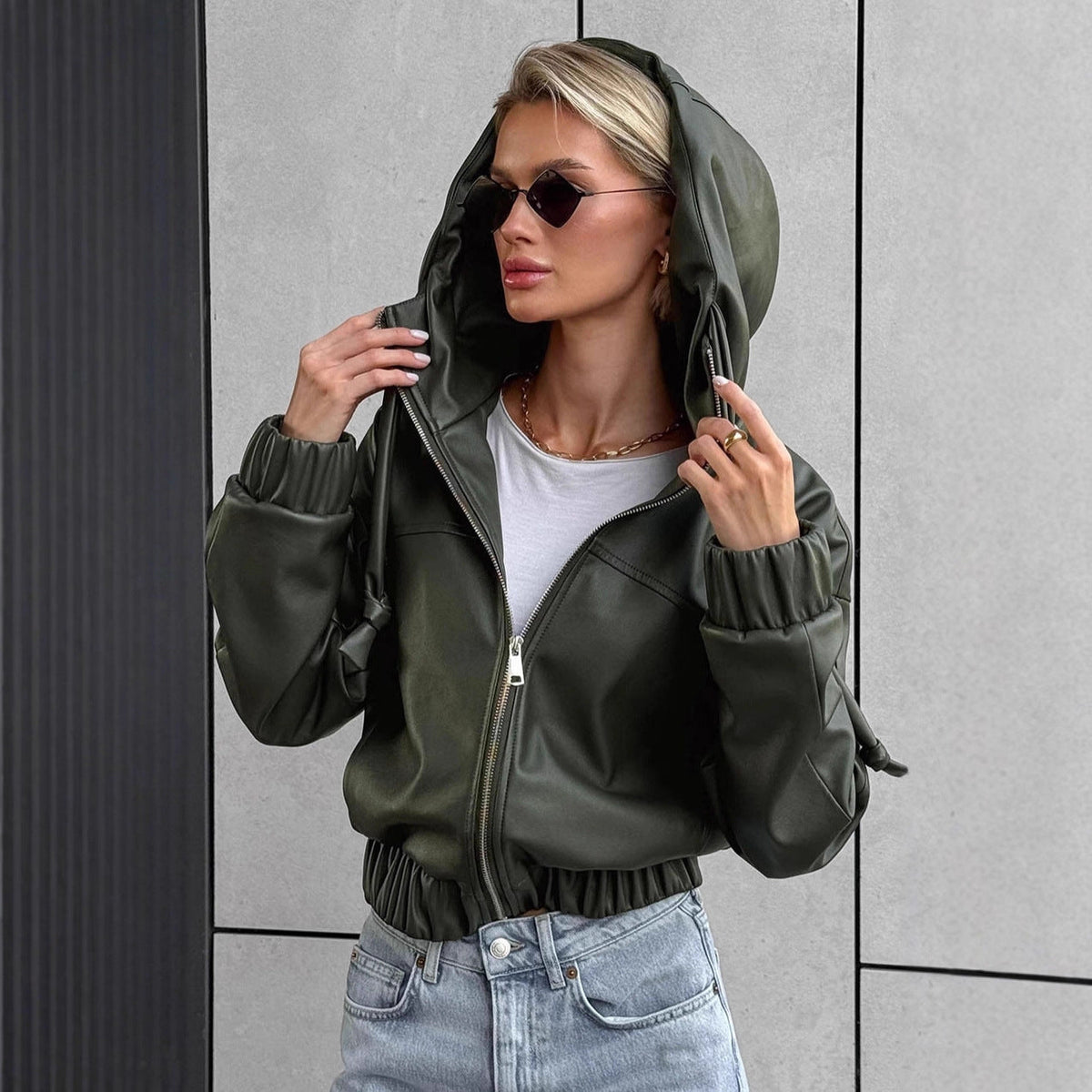 Women's Cropped Faux Leather Jacket with Contrasting Details and Elastic Hem