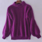 Women's fluffy turtleneck pullover with puff sleeves and textured design