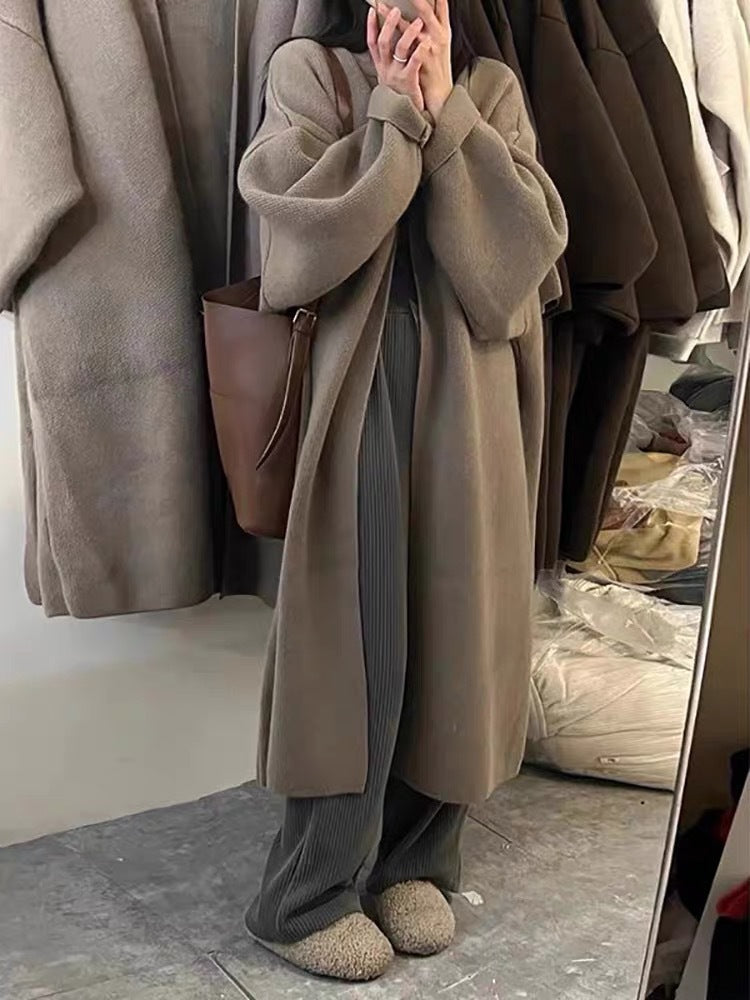 Women's Minimalist Long Wool Coat with Wide Cut and Elegant Details