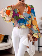 Blouse with V-Neck and Fashionable Graphic Design