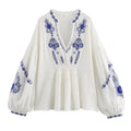 Women's Blouse with Floral Embroidery and Voluminous Sleeves