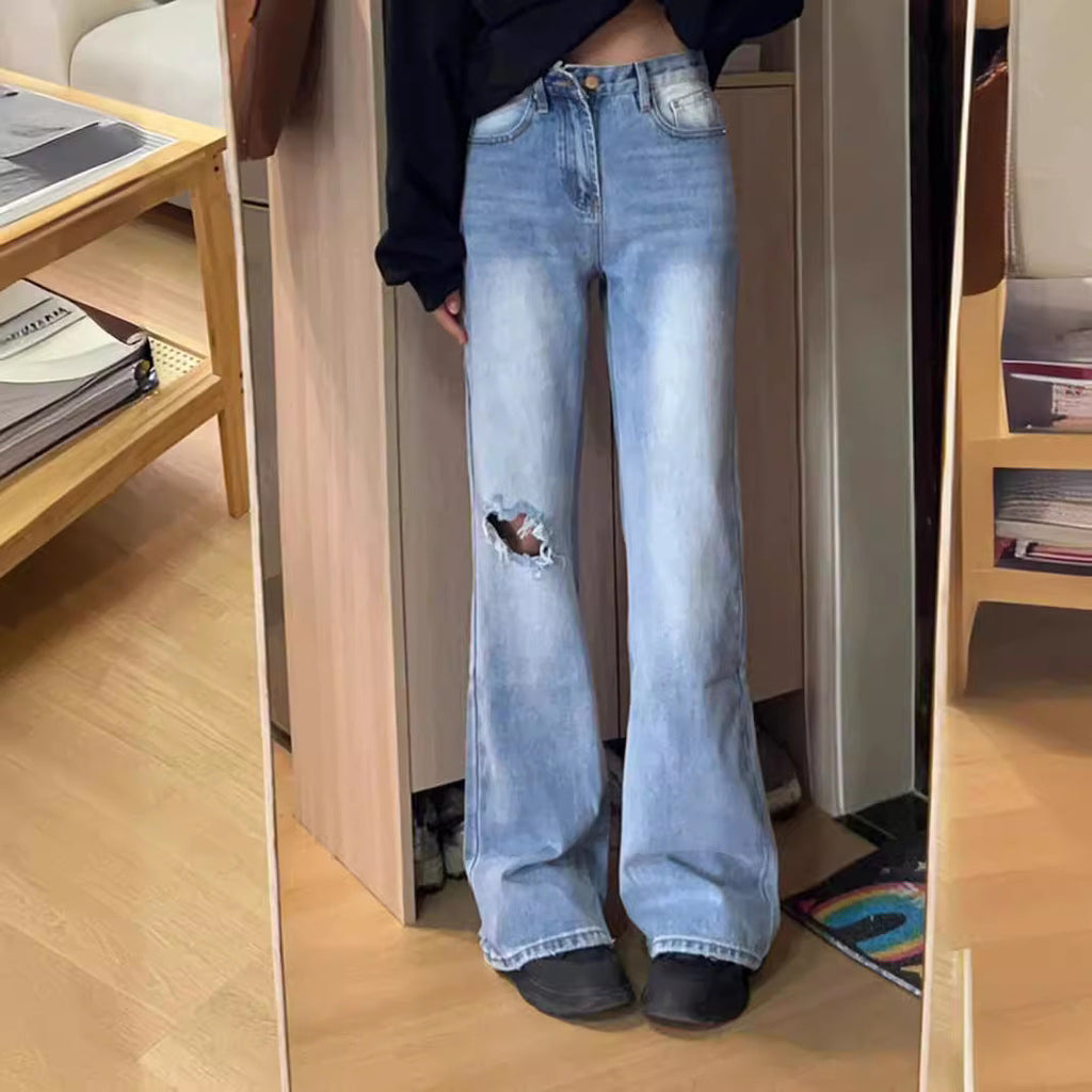 Women's High-Waisted Flared Jeans with Distressed Details