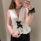 Women's Sleeveless Top with Decorative Bows and Elastic Waist