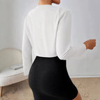Elegant Short Jacket with Modern Cut and Refined Pleats