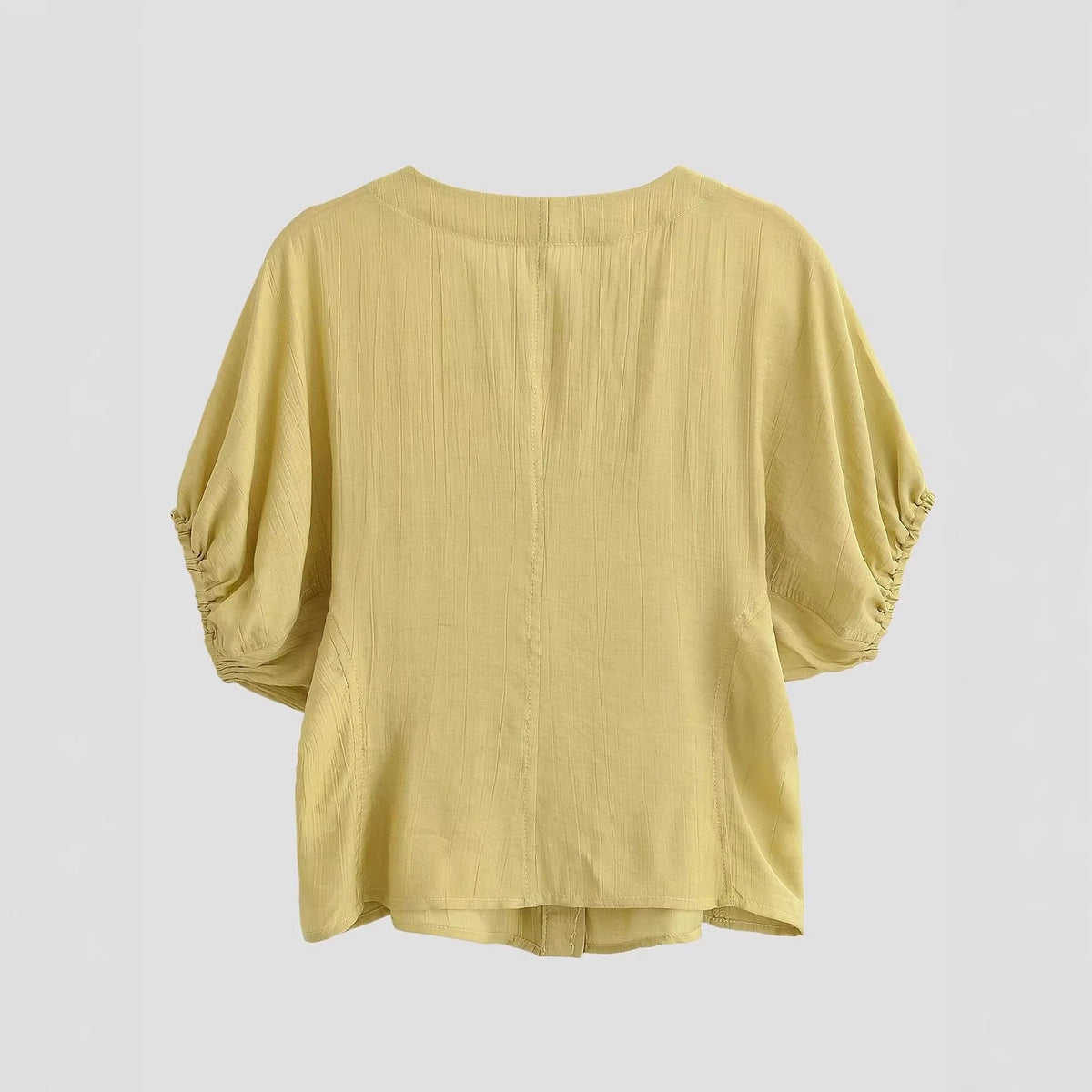Women's Blouse with Puff Sleeves and Decorative Buttons
