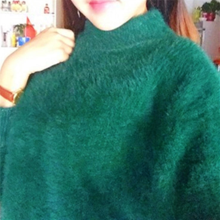 Women's fluffy turtleneck pullover with puff sleeves and textured design