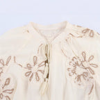 Women's Blouse with Floral Embroidery and Elegant Tassels